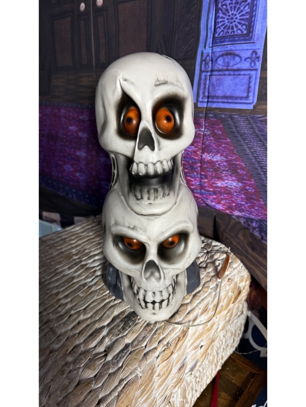 Double Skull Halloween Decoration with Orange Eyes and Spider Web Detail